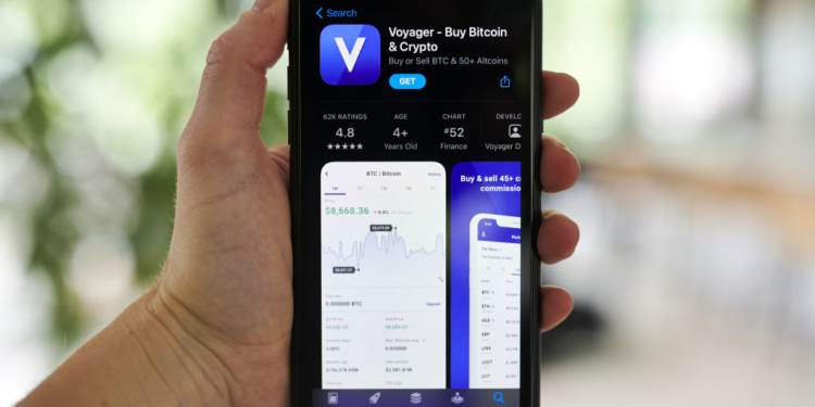 The Voyager Digital Ltd. application for download in the Apple App Store on a smartphone arranged in Little Falls, New Jersey, U.S., on Saturday, May 22, 2021. Elon Musk continued to toy with the price of Bitcoin Monday, taking to Twitter to indicate support for what he says is an effort by miners to make their operations greener. Photographer: Gabby Jones/Bloomberg via Getty Images